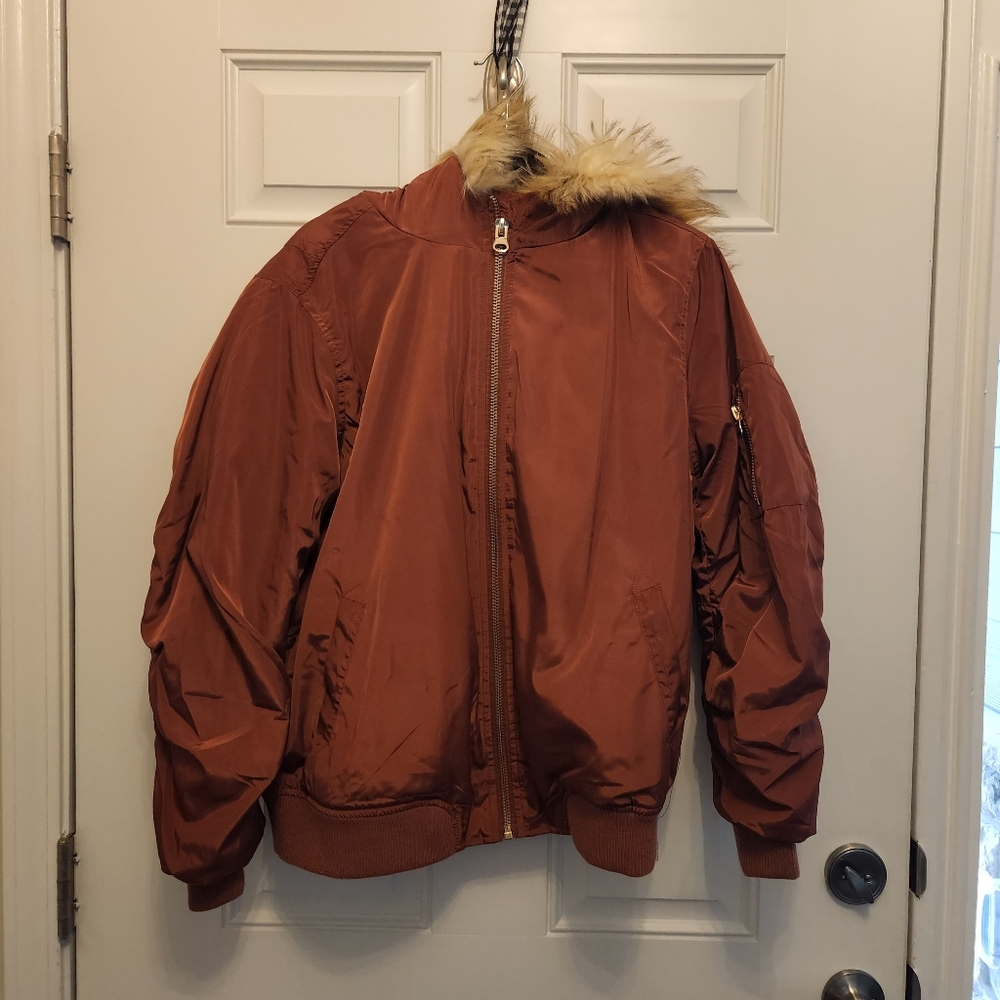 Burnt orange Bomber jacket with faux fur hoodie.